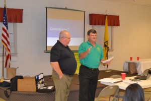 Ricky George, past President is presented Chapter recognition award by Ray Powell, President.