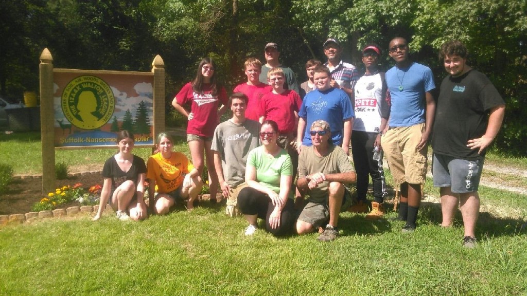 Dylan, pictured here, kneeling center left and the members of his Eagle Scout work crew.