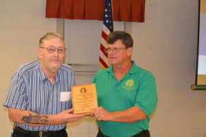 Bill Schlaffer is presented a National Conservation Award by Ray Powell, Chapter President