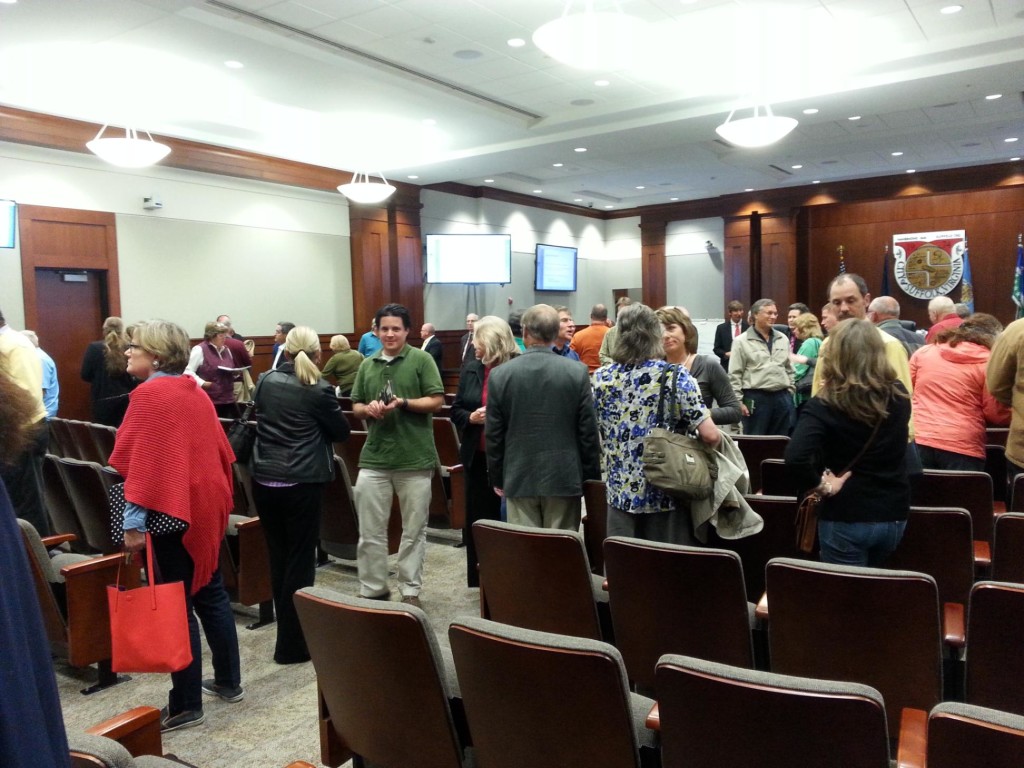 Attendees continued the enthusiastic discussions after the meeting.