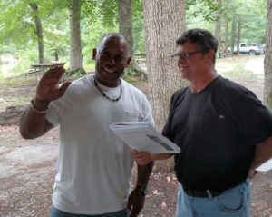 Roger Taylor is sworn in as a new member by Ray Powell. Welcome, Roger!